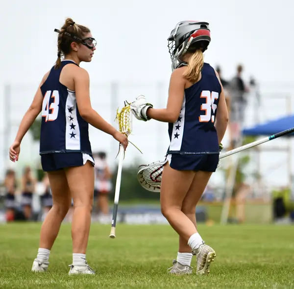 Teammates talking on the field